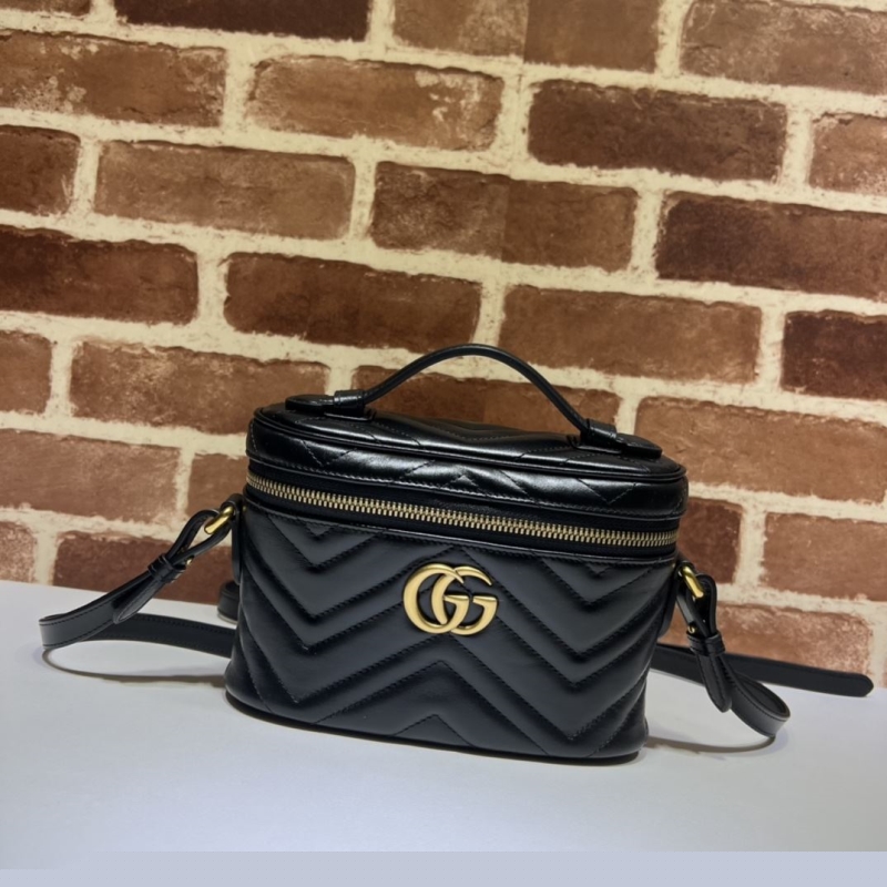 G*u*i cosmetic bags